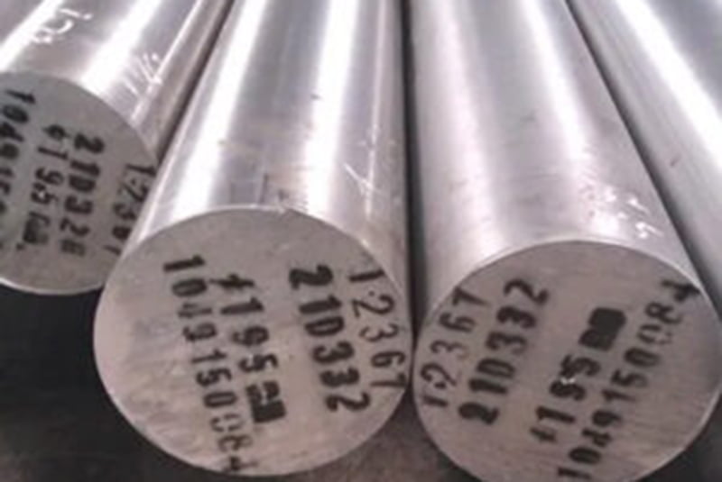 Round steel bars with visible grade or batch markings on the end faces