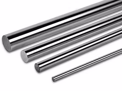 Bundle of polished stainless-steel round bars with bright reflective surfaces